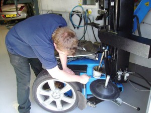 Mechanic working on a tyre